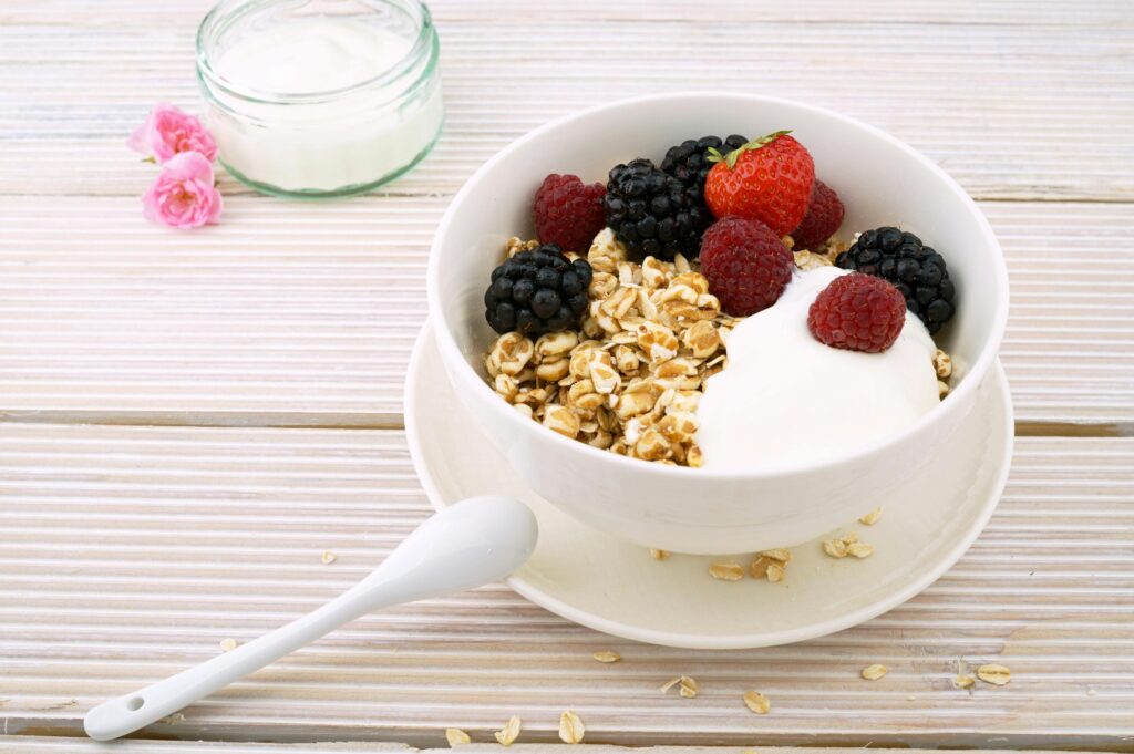 pexels-photo-128865-128865 Delicious granola bowl topped with fresh berries and yogurt, perfect for a healthy breakfast.